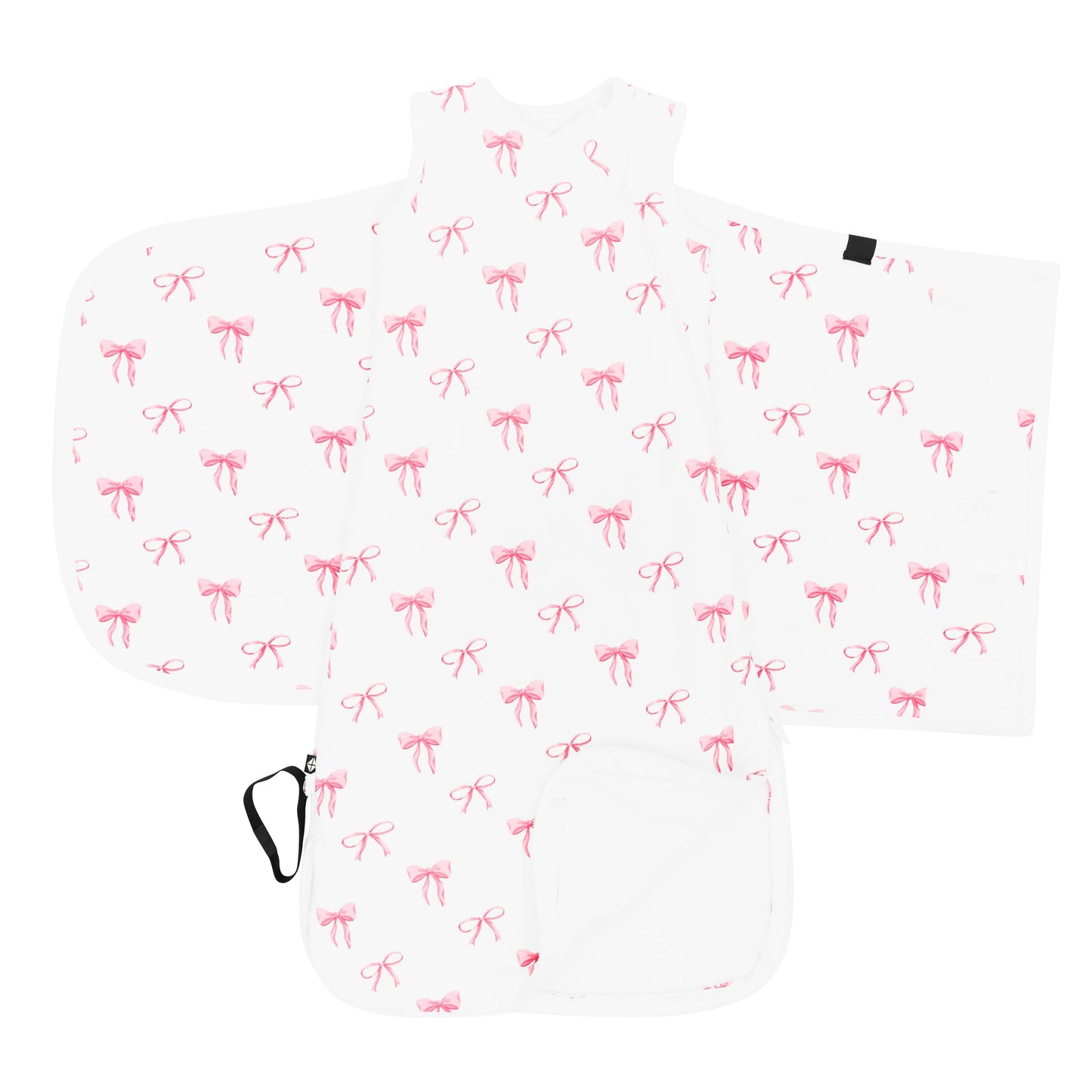 Kyte Baby's Sleep Bag Swaddler in Bow 1.0 shown unswaddled with the bottom zipper undone