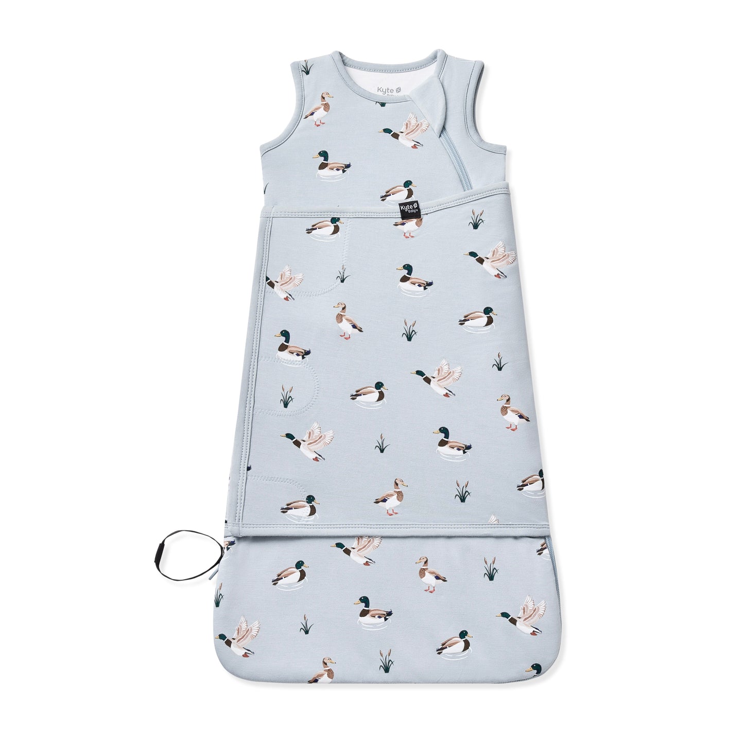 Sleep Bag Swaddler in Mallard Duck 1.0 shown swaddled on a white surface