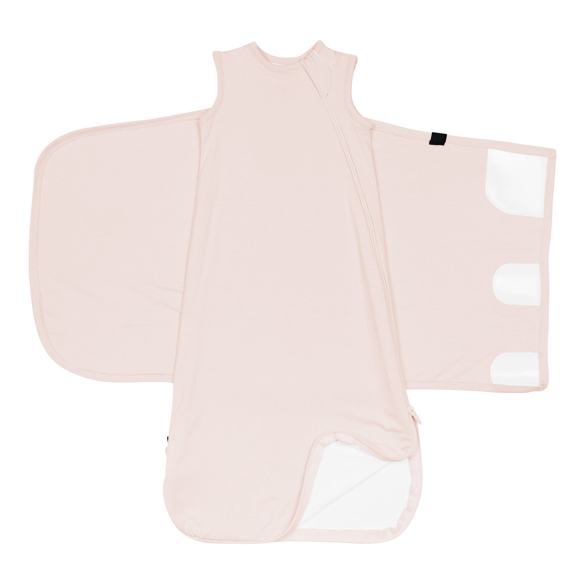 Sleep Bag Swaddler in Blush 0.5 shown unswaddled with bottom zipper undone